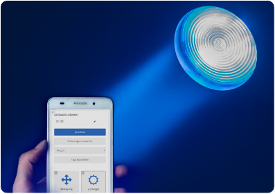 Smartphone und Scheinwerfer